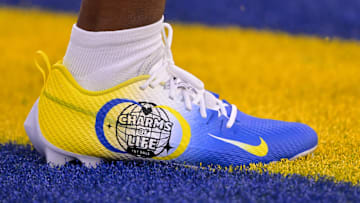Custom cleats, to support Charms of Life, worn by Los Angeles Rams safety Kamren Kinchens, during the NFL's My Cause My Cleats weekend.