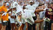 Mississippi State Bulldogs tight end Seydou Traore (8) dives for a touchdown against the Tennessee Volunteers during the second half at Davis Wade Stadium at Scott Field.
