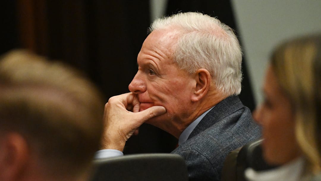 Feb 3, 2026; Berea, OH, USA; Cleveland Browns managing and principal partner Jimmy Haslam listens as head coach Todd Monken speaks to the media during an introductory press conference at CrossCountry Mortgage Campus. Mandatory Credit: Ken Blaze-Imagn Images