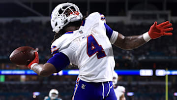 James Cook of the Buffalo Bills celebrates one of his three touchdowns against the Miami Dolphins on Thursday Night Football.