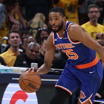 New York Knicks forward Mikal Bridges dribbles the ball defended by Indiana Pacers guard Tyrese Haliburton. Mandatory Credit: Trevor Ruszkowski-Imagn Images