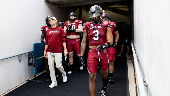 Dec 30, 2022; Jacksonville, FL, USA; South Carolina Gamecocks head coach Shane Beamer and South Carolina Gamecocks wide receiver Antwane Wells Jr. (3) walk out the team tunnel before the game against the Notre Dame Fighting Irish in the 2022 Gator Bowl at TIAA Bank Field. Mandatory Credit: Matt Pendleton-USA TODAY Sports