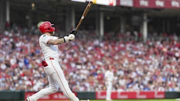 Jul 29, 2025; Cincinnati, Ohio, USA;  Cincinnati Reds outfielder Jake Fraley (27) watches his two-run home run against the Los Angeles Dodgers in the fourth inning at Great American Ball Park. Mandatory Credit: Aaron Doster-Imagn Images
