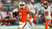 Miami wide receiver Keelan Marion catches a touchdown pass against Syracuse.