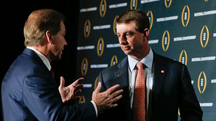 Coach Nick Saban and coach Dabo Swinney meet the media at the JW Marriott Scottsdale Camelback Inn Resort & Spa Sunday, January 10, 2016. Saban and Swinney talk together briefly after the conclusion of the media event. Staff Photo | Gary Cosby Jr.