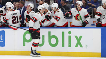 Oct 9, 2025; Tampa, Florida, USA; Ottawa Senators center Shane Pinto (12) is congratulated after he scored a goal against the Tampa Bay Lightning during the third period at Benchmark International Arena. Mandatory Credit: Kim Klement Neitzel-Imagn Images