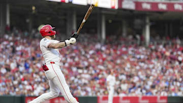 Jul 29, 2025; Cincinnati, Ohio, USA;  Cincinnati Reds outfielder Jake Fraley (27) watches his two-run home run against the Los Angeles Dodgers in the fourth inning at Great American Ball Park. Mandatory Credit: Aaron Doster-Imagn Images