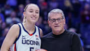 Jan 22, 2025; Storrs, Connecticut, USA; UConn Huskies guard Paige Bueckers (5) is recognized with head coach Geno Auriemma for her 2000 career points before the start of the game against the Villanova Wildcats at Harry A. Gampel Pavilion. Mandatory Credit: David Butler II-Imagn Images