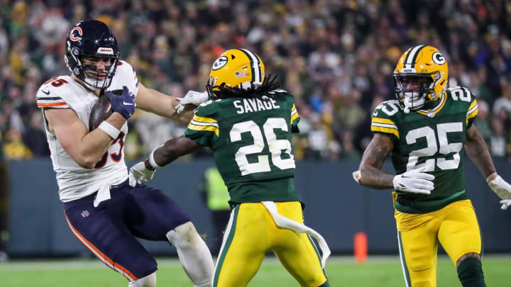 Chicago Bears tight end Cole Kmet tries to elude Packers safety Darnell Savage in last year's season finale after a reception in a 17-9 Bears loss.