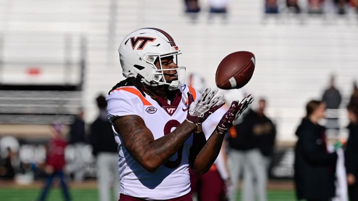 Nov 11, 2023; Chestnut Hill, Massachusetts, USA; Virginia Tech Hokies tight end Dae'Quan Wright (8) warms up before a game against the Boston College Eagles at Alumni Stadium. Mandatory Credit: Eric Canha-USA TODAY Sports