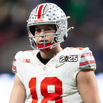 Jan 20, 2025; Atlanta, GA, USA; Ohio State Buckeyes quarterback Will Howard (18) against the Notre Dame Fighting Irish during the CFP National Championship college football game at Mercedes-Benz Stadium. Mandatory Credit: Mark J. Rebilas-Imagn Images
