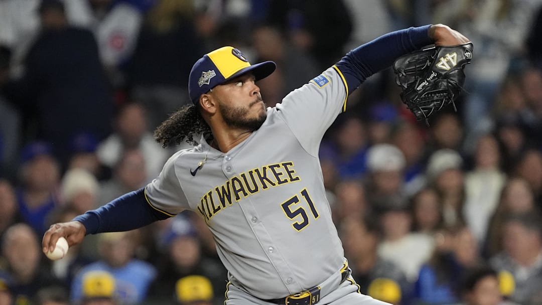Oct 9, 2025; Chicago, Illinois, USA; Milwaukee Brewers pitcher Freddy Peralta (51) throws pitch against the Chicago Cubs during the first inning for game four of the NLDS round for the 2025 MLB playoffs at Wrigley Field. Mandatory Credit: David Banks-Imagn Images