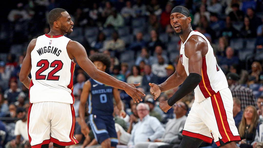 Oct 24, 2025; Memphis, Tennessee, USA; Miami Heat forward Andrew Wiggins (22) reacts with center Bam Adebayo (13) during the second quarter against the Memphis Grizzlies at FedExForum. Mandatory Credit: Petre Thomas-Imagn Images Oct 24, 2025; Memphis, Tennessee, USA; Miami Heat forward Andrew Wiggins (22) reacts with center Bam Adebayo (13) during the second quarter against the Memphis Grizzlies at FedExForum. Mandatory Credit: Petre Thomas-Imagn Images