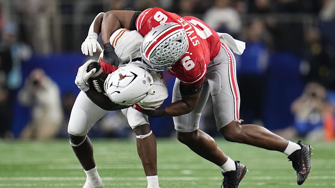 Ohio State Buckeyes safety Sonny Styles (6) tackles Texas Longhorns wide receiver Ryan Wingo (5) during the second half of the Cotton Bowl Classic College Football Playoff semifinal game at AT&T Stadium in Arlington, Texas on Jan. 10, 2025. Ohio State won 28-14.