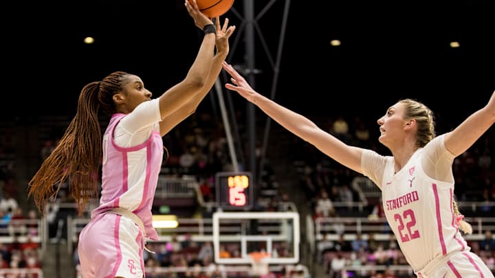 Feb 17, 2023; Stanford, California, USA;  USC Trojans forward Kadi Sissoko (30) shoots over Stanford Cardinal forward Cameron Brink (22) during the second half at Maples Pavilion. Mandatory Credit: John Hefti-Imagn Images