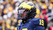Michigan quarterback Bryce Underwood looks on during warmup at Michigan Stadium in Ann Arbor.