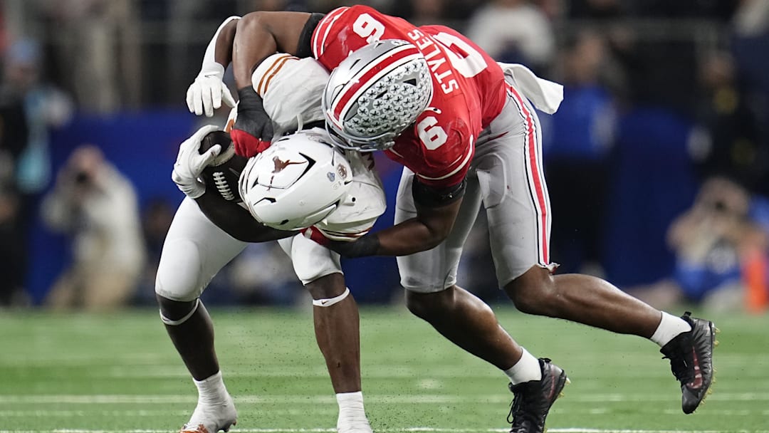 Ohio State Buckeyes safety Sonny Styles (6) tackles Texas Longhorns wide receiver Ryan Wingo (5) during the second half of the Cotton Bowl Classic College Football Playoff semifinal game at AT&T Stadium in Arlington, Texas on Jan. 10, 2025. Ohio State won 28-14.