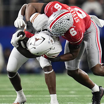 Ohio State Buckeyes safety Sonny Styles (6) tackles Texas Longhorns wide receiver Ryan Wingo (5) during the second half of the Cotton Bowl Classic College Football Playoff semifinal game at AT&T Stadium in Arlington, Texas on Jan. 10, 2025. Ohio State won 28-14.