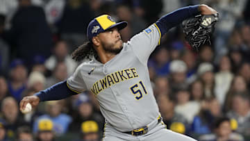 Oct 9, 2025; Chicago, Illinois, USA; Milwaukee Brewers pitcher Freddy Peralta (51) throws pitch against the Chicago Cubs during the first inning for game four of the NLDS round for the 2025 MLB playoffs at Wrigley Field. Mandatory Credit: David Banks-Imagn Images