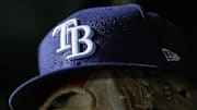 Apr 3, 2023; Washington, District of Columbia, USA; A general view of a Tampa Bay Rays hat and glove during the seventh inning of the game against the Washington Nationals at Nationals Park. 