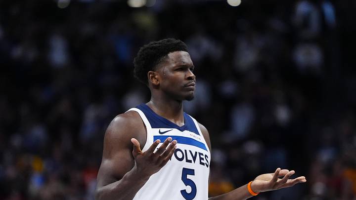 Dec 25, 2025; Denver, Colorado, USA; Minnesota Timberwolves guard Anthony Edwards (5) reacts to a flagrant foul called in overtime against the against the Denver Nuggets at Ball Arena. Mandatory Credit: Ron Chenoy-Imagn Images