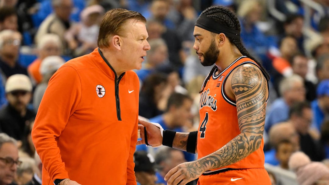 Feb 21, 2026; Los Angeles, California, USA; Illinois Fighting Illini head coach Brad Underwood with guard Kylan Boswell (4) during the second half at Pauley Pavilion.