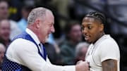 Texas A&M Aggies head coach Buzz Williams and guard Wade Taylor IV (4) reacts after the win over Yale Bulldogs at Ball Arena.