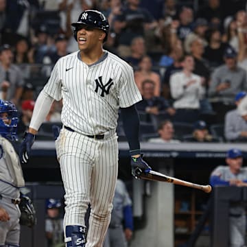 Sep 11, 2024; Bronx, New York, USA; New York Yankees right fielder Juan Soto (22) reacts after his two run home run during the sixth inning against the Kansas City Royals at Yankee Stadium. Mandatory Credit: Vincent Carchietta-Imagn Images