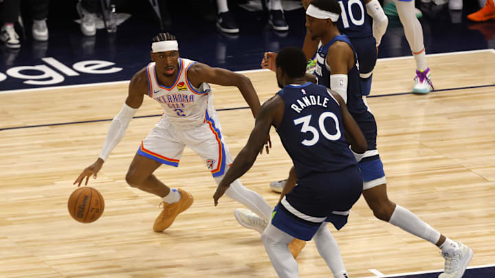 Oklahoma City Thunder guard Shai Gilgeous-Alexander dribbles against Julius Randle during the 2025 NBA Playoffs Oklahoma City Thunder guard Shai Gilgeous-Alexander dribbles against Julius Randle during the 2025 NBA Playoffs