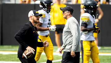 Aug 9, 2025; Iowa defensive coordinator Phil Parker walks down the field during the Hawkeyes Kids Day NCAA football open practice at Kinnick Stadium in Iowa City, Iowa. Mandatory Credit: Joseph Cress for the Des Moines Register