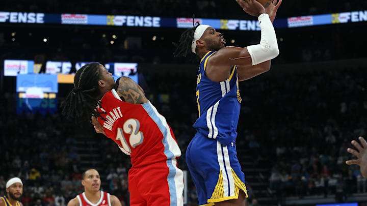 Ja Morant defends Buddy Hield during the Grizzlies loss to the Warriors. Ja Morant defends Buddy Hield during the Grizzlies loss to the Warriors.