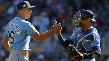 Sep 13, 2023; Minneapolis, Minnesota, USA; Tampa Bay Rays relief pitcher Robert Stephenson (26) and