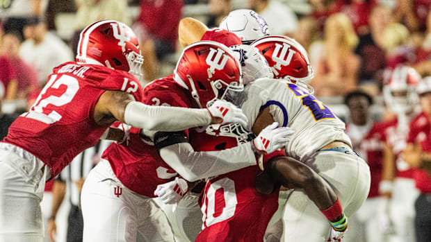 Western Illinois Leathernecks running back Cameren Smith (25)  runs the ball while Indiana Hoosiers defensive defends in the 