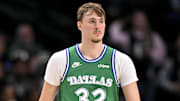 Nov 12, 2025; Dallas, Texas, USA; Dallas Mavericks forward Cooper Flagg (32) walks back up the court during the second half against the Phoenix Suns at the American Airlines Center. Mandatory Credit: Jerome Miron-Imagn Images
