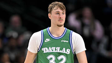 Nov 12, 2025; Dallas, Texas, USA; Dallas Mavericks forward Cooper Flagg (32) walks back up the court during the second half against the Phoenix Suns at the American Airlines Center. Mandatory Credit: Jerome Miron-Imagn Images