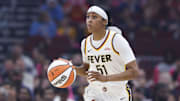 Jul 27, 2025; Chicago, Illinois, USA; Indiana Fever guard Sydney Colson (51) brings the ball up court against the Chicago Sky during the first half at United Center. Mandatory Credit: Kamil Krzaczynski-Imagn Images