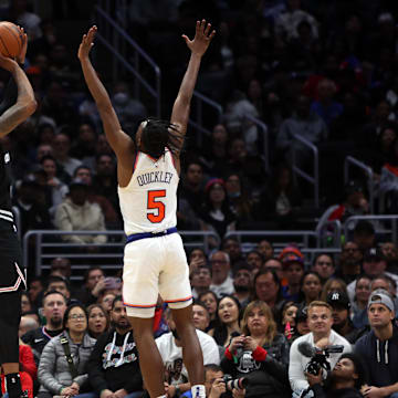 Los Angeles Clippers forward Marcus Morris Sr. (8) shoots a three point basket against New York Knicks guard Immanuel Quickley (5) at Crypto.com Arena.