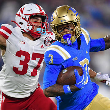 Donovan Jones brings down Kwazi Gilmer after a catch. 