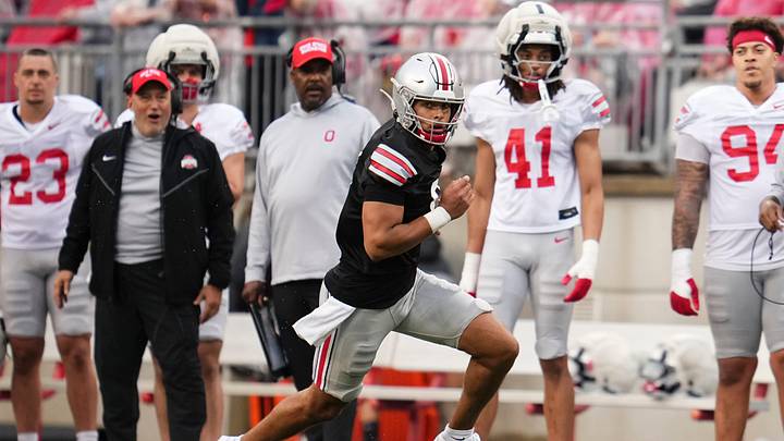 Quarterback Tavien St. Clair (9) runs during the Ohio State football spring game at Ohio Stadium in Columbus on April 18, 2026.