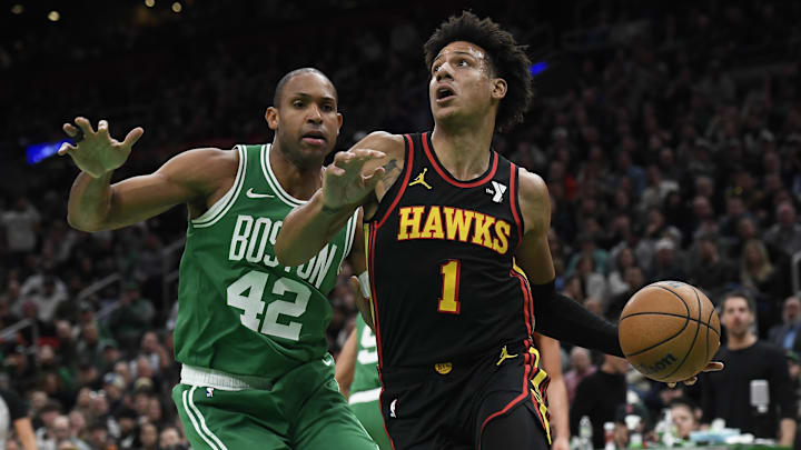 Feb 7, 2024; Boston, Massachusetts, USA; Atlanta Hawks forward Jalen Johnson (1) drives to the basket while Boston Celtics center Al Horford (42) defends during the first half at TD Garden. Mandatory Credit: Bob DeChiara-Imagn Images Feb 7, 2024; Boston, Massachusetts, USA; Atlanta Hawks forward Jalen Johnson (1) drives to the basket while Boston Celtics center Al Horford (42) defends during the first half at TD Garden. Mandatory Credit: Bob DeChiara-Imagn Images