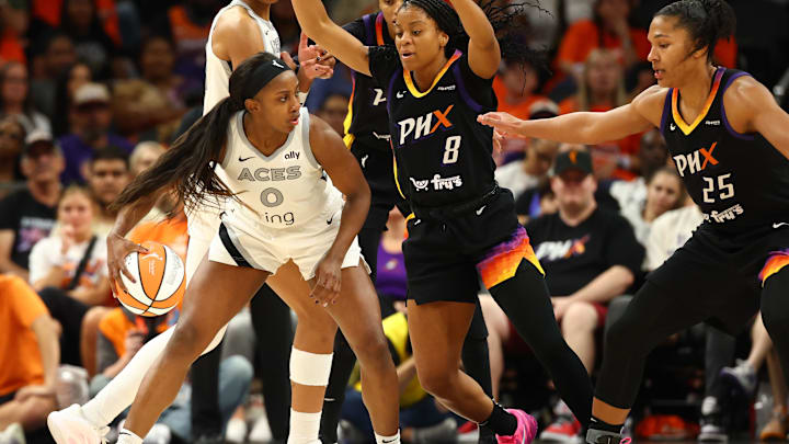 Oct 8, 2025; Phoenix, Arizona, USA; Las Vegas Aces guard Jackie Young (0) dribbles the ball against Phoenix Mercury forward Alyssa Thomas (25) in the second half during game three of the 2025 WNBA Finals at PHX Arena. Mandatory Credit: Mark J. Rebilas-Imagn Images Oct 8, 2025; Phoenix, Arizona, USA; Las Vegas Aces guard Jackie Young (0) dribbles the ball against Phoenix Mercury forward Alyssa Thomas (25) in the second half during game three of the 2025 WNBA Finals at PHX Arena. Mandatory Credit: Mark J. Rebilas-Imagn Images
