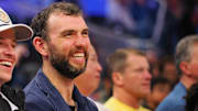 Jan 5, 2025; San Francisco, California, USA; Retired NFL quarter Andrew Luck smiles court side during the fourth quarter of the game between the Golden State Warriors and Sacramento Kings at Chase Center. Mandatory Credit: Kelley L Cox-Imagn Images