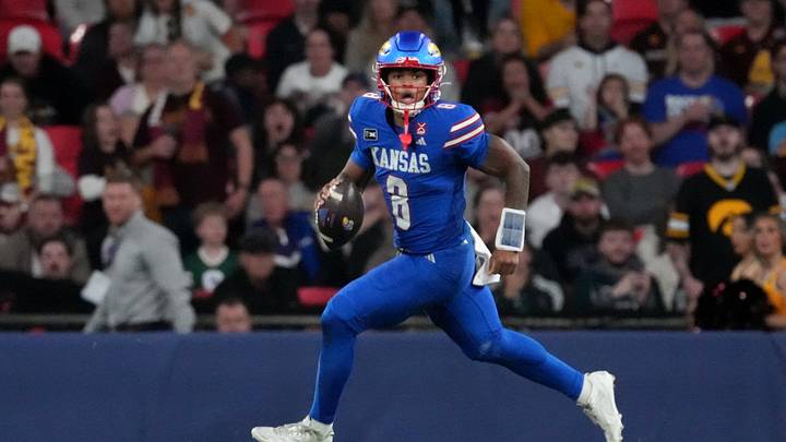 Kansas Jayhawks quarterback Isaiah Marshall (8) 