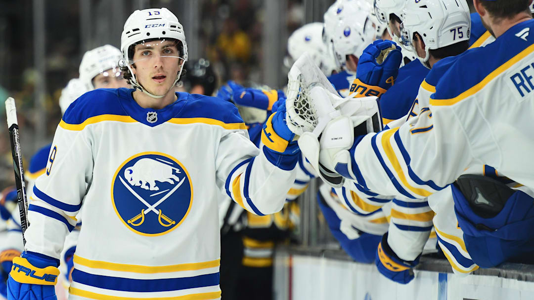 Mar 17, 2025; Boston, Massachusetts, USA;  Buffalo Sabres center Peyton Krebs (19) is congratulated by his teammates after scoring a goal during the first period against the Boston Bruins at TD Garden. Mandatory Credit: Bob DeChiara-Imagn Images