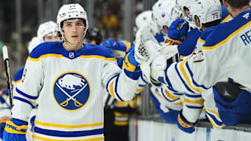 Mar 17, 2025; Boston, Massachusetts, USA;  Buffalo Sabres center Peyton Krebs (19) is congratulated by his teammates after scoring a goal during the first period against the Boston Bruins at TD Garden. Mandatory Credit: Bob DeChiara-Imagn Images