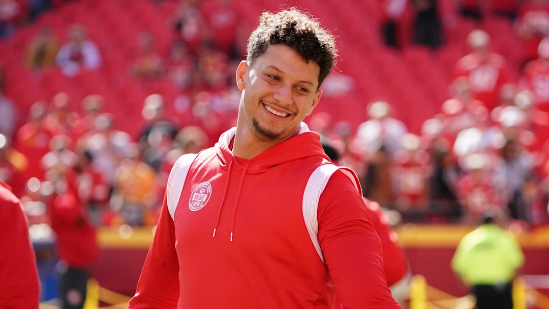 Oct 22, 2023; Kansas City, Missouri, USA; Kansas City Chiefs quarterback Patrick Mahomes (15) laughs during warm ups against the Los Angeles Chargers prior to a game at GEHA Field at Arrowhead Stadium. Mandatory Credit: Denny Medley-Imagn Images