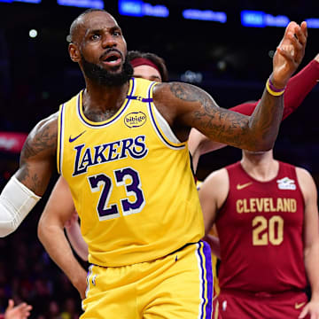 Dec 31, 2024; Los Angeles, California, USA; Los Angeles Lakers forward LeBron James (23) reacts during the first half at Crypto.com Arena. Mandatory Credit: Gary A. Vasquez-Imagn Images