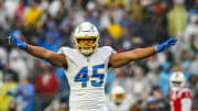 Dec 3, 2023; Foxborough, Massachusetts, USA; Los Angeles Chargers linebacker Tuli Tuipulotu (45) reacts after stoping the first down against the New England Patriots in the second quarter at Gillette Stadium. Mandatory Credit: David Butler II-USA TODAY Sports