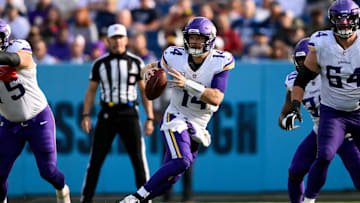 Minnesota Vikings quarterback Sam Darnold scrambles against the Tennessee Titans