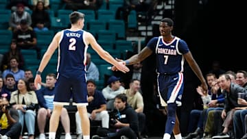 Nov 24, 2025; Las Vegas, Nevada, USA; Gonzaga Bulldogs guard Tyon Grant-Foster (7) and forward Steele Venters (2) react during the first half against the Alabama Crimson Tide in a 2025 Players Era Festival group play game at MGM Grand Garden Arena.